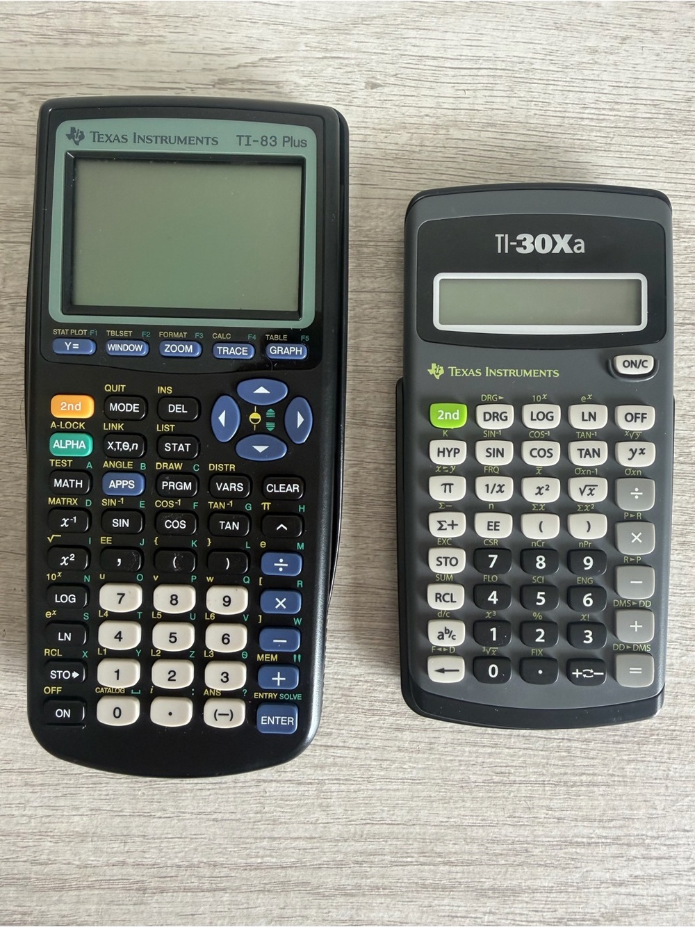 Texas Instruments TI-83 Plus Graphing & Texas Instruments TI-30Xa Calculators